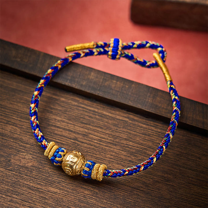 Buddha Stones Braccialetto della pace Om Mani Padme Hum con cordino intrecciato a mano - Blu - Con l'accessorio Om Mani Padme Hum - image 0