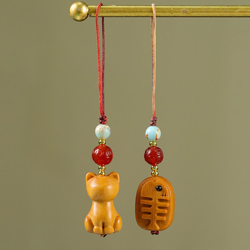 Buddha Stones Portachiavi purificanti per pesci gatto in legno di sandalo intagliati a mano - image 0