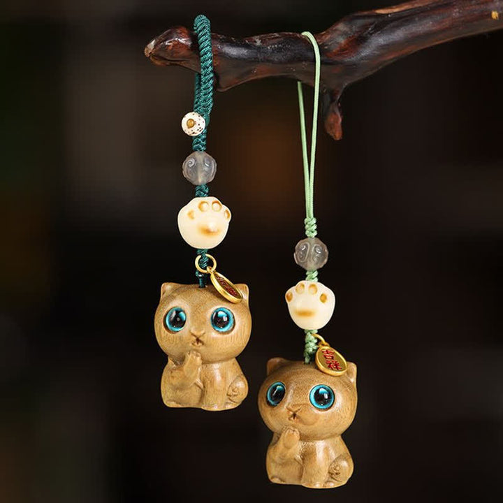 Buddha Stones Portachiavi rilassanti intrecciati a mano con gatto in legno di sandalo verde. - image 0