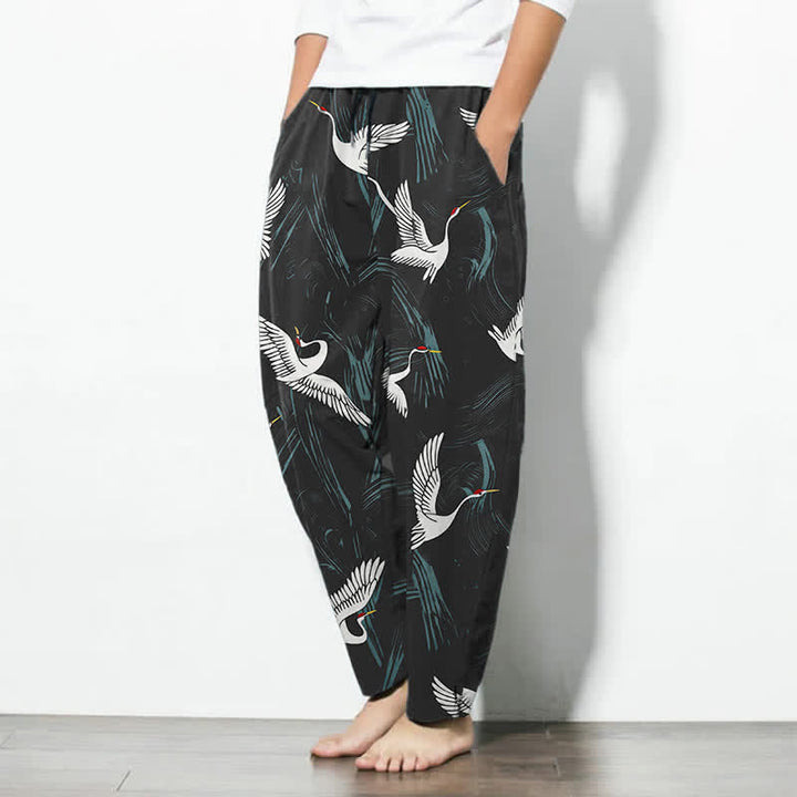 Buddha Stones Pantaloni da uomo affusolati in puro cotone, con coulisse, fantasia gru bianca e nera e motivo a gru, con tasche, colore nero. - image 1