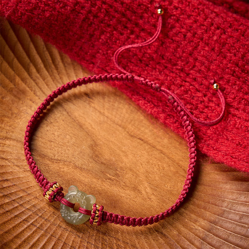 Buddha Stones Bracciale intrecciato con cordino rosso e fibbia a forma di testa di tigre in giada. - image 1