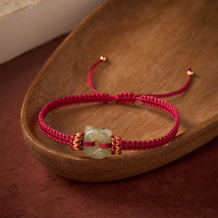 Buddha Stones Bracciale intrecciato con cordino rosso e fibbia a forma di testa di tigre in giada. - image 2