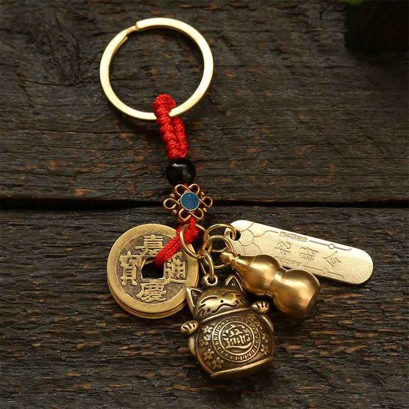 Buddha Stones Portachiavi in ​​ottone con moneta cinese portafortuna a forma di gatto. - Monete con cordino rosso - image 0