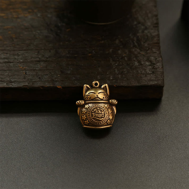 Buddha Stones Portachiavi in ​​ottone con moneta cinese portafortuna a forma di gatto. - image 19