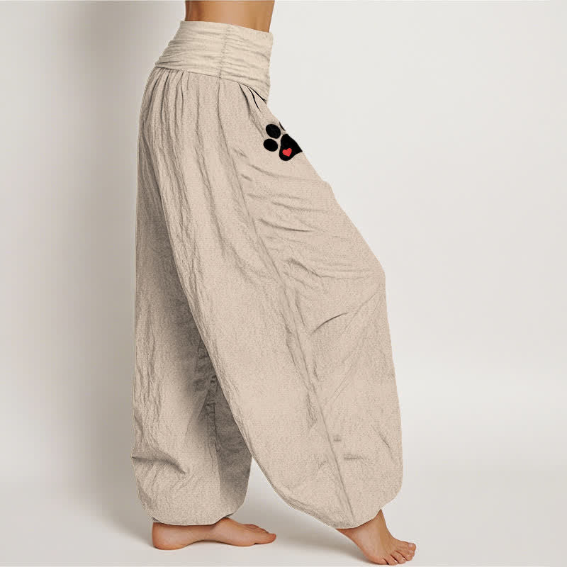 Buddha Stones Pantaloni harem da donna in puro cotone bianco con stampa di zampe e elastico in vita. - image 15