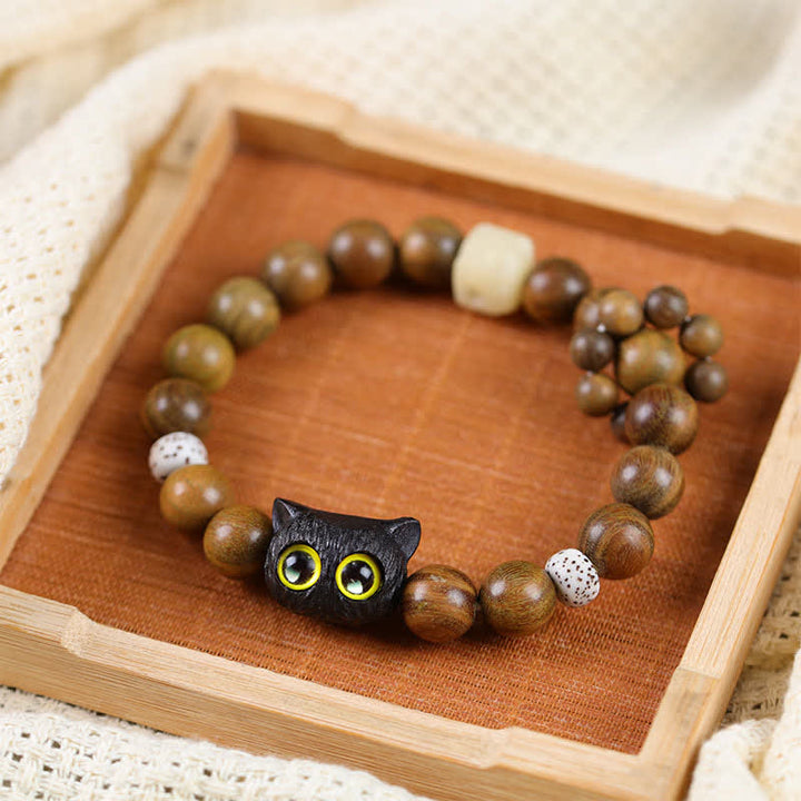 Buddha Stones Braccialetto con perline in legno d'ebano a forma di gatto portafortuna, simbolo di radicamento. - Gatto nero portafortuna - image 0