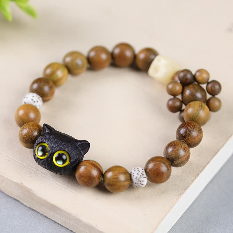Buddha Stones Braccialetto con perline in legno d'ebano a forma di gatto portafortuna, simbolo di radicamento. - image 2