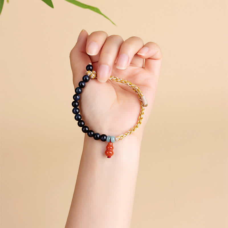 Buddha Stones Bracciale rinforzato con zucca intrecciata a mano e occhio di tigre blu. - image 4