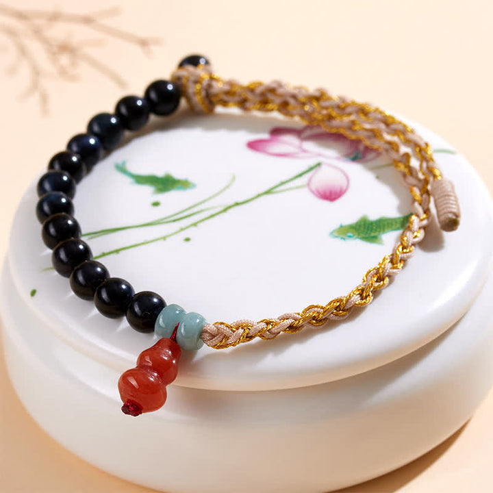 Buddha Stones Bracciale rinforzato con zucca intrecciata a mano e occhio di tigre blu. - image 3