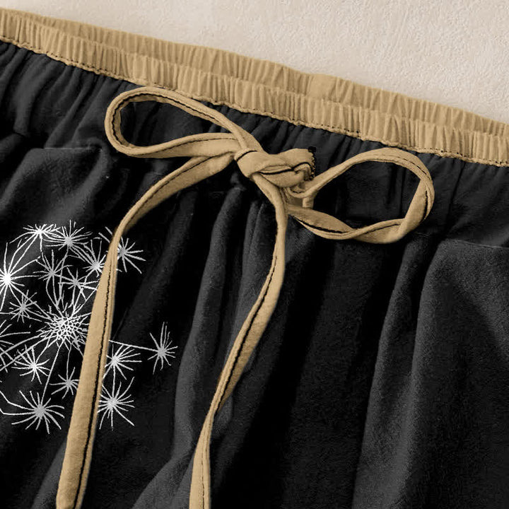 Buddha Stones Pantaloni da donna in puro cotone bianco con fantasia a dente di leone, elastico in vita e tasche. - image 1