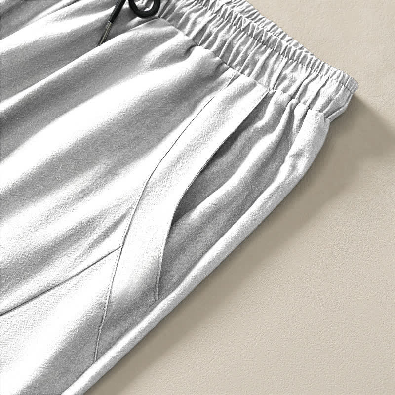 Buddha Stones Pantaloni da uomo affusolati con coulisse e tasche, in puro cotone, con stampa "Bundle Crane Reed". - image 4