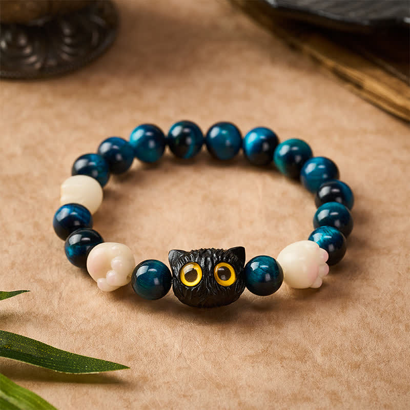 Buddha Stones Braccialetto di radicamento con perline a forma di gatto intagliate a mano in occhio di tigre blu. - image 1