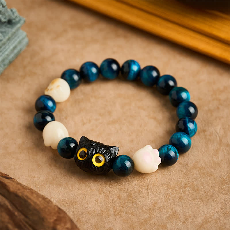 Buddha Stones Braccialetto di radicamento con perline a forma di gatto intagliate a mano in occhio di tigre blu. - Occhio di tigre blu (Protezione ♥ Equilibrio) (Circonferenza del polso: 16–17 cm) - image 0