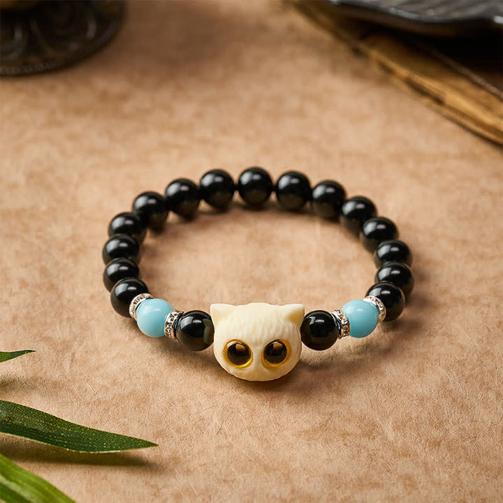 Buddha Stones Bracciale con perline in ossidiana nera intagliate a mano con rilievo di gatto dagli occhi grandi. - image 15