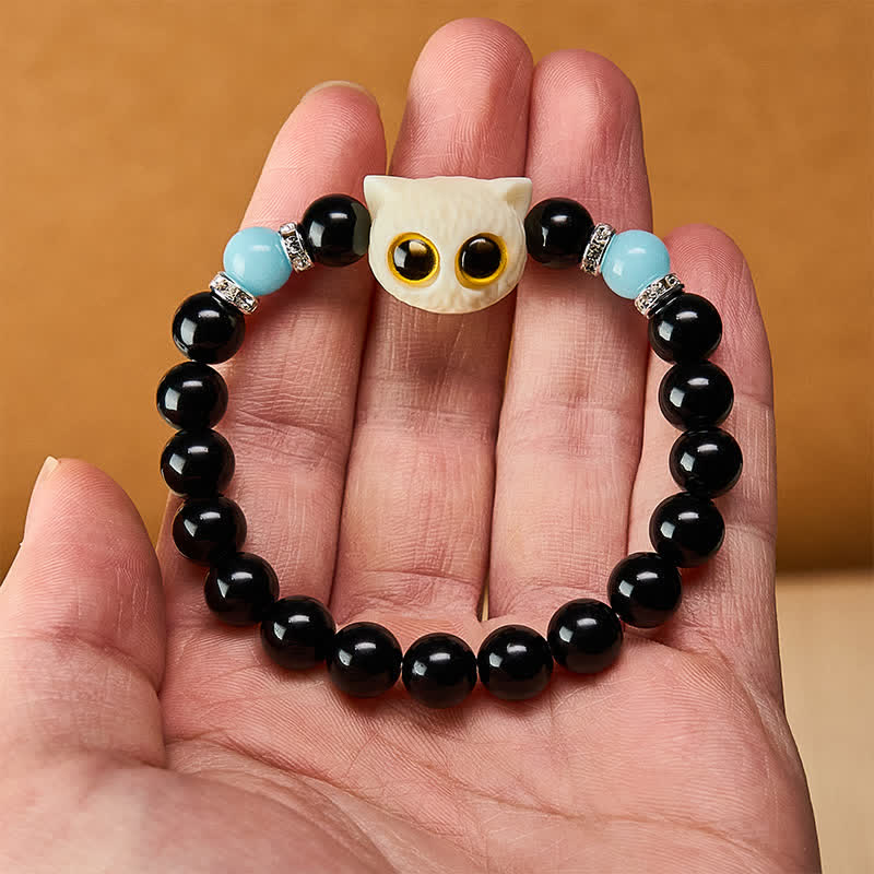 Buddha Stones Bracciale con perline in ossidiana nera intagliate a mano con rilievo di gatto dagli occhi grandi. - image 21