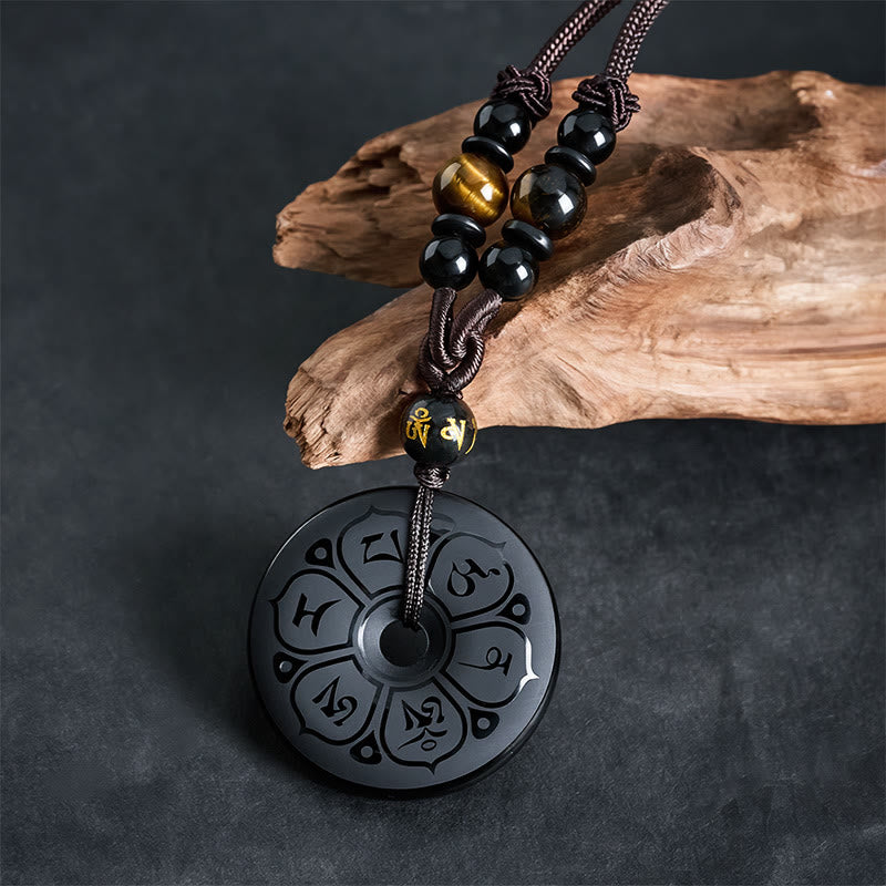 Buddha Stones Collana intrecciata con fibbia della pace in ossidiana nera e incisione protettiva. - image 1