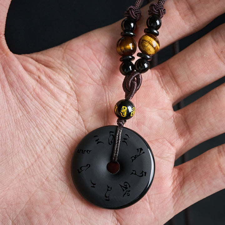 Buddha Stones Collana intrecciata con fibbia della pace in ossidiana nera e incisione protettiva. - image 12