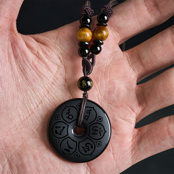 Buddha Stones Collana intrecciata con fibbia della pace in ossidiana nera e incisione protettiva. - image 17