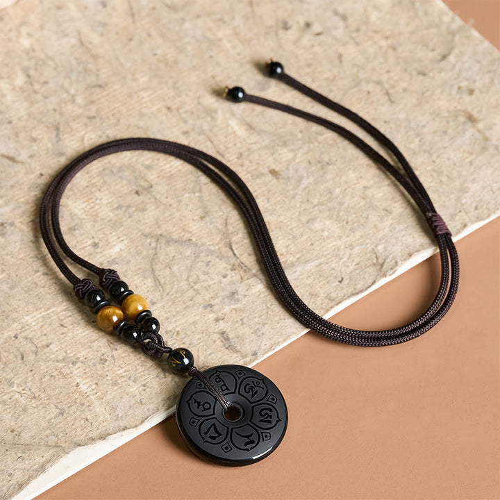 Buddha Stones Collana intrecciata con fibbia della pace in ossidiana nera e incisione protettiva. - image 16