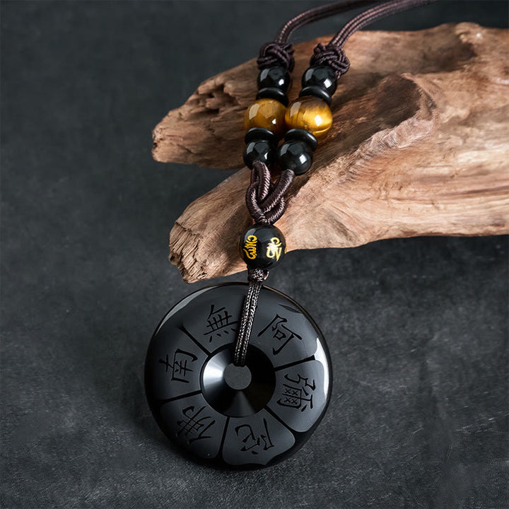 Buddha Stones Collana con fibbia di protezione incisa Namo Ami Peace in ossidiana nera. - image 1