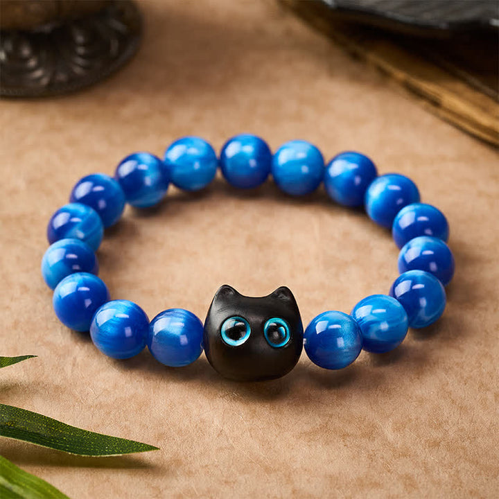 Buddha Stones Bracciale a forma di gatto con perline di resina blu e legno di ebano. - image 1