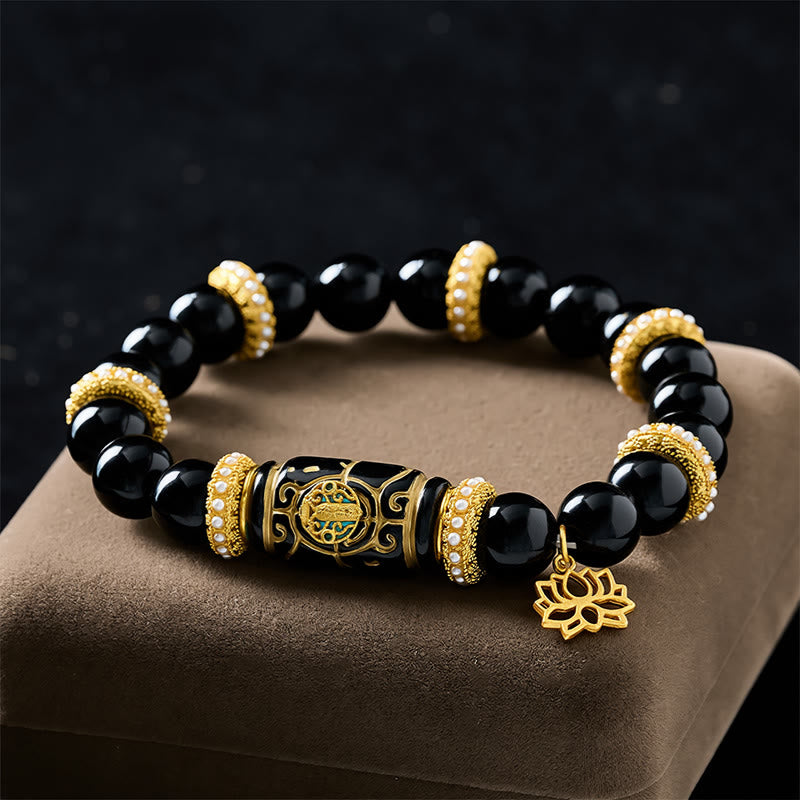Buddha Stones Bracciale con ciondolo a forma di loto in resina di ossidiana nera, perline a barilotto, protezione e perline rotonde. - image 1