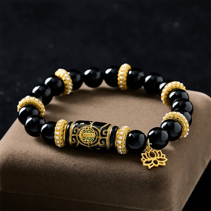 Buddha Stones Bracciale con ciondolo a forma di loto in resina di ossidiana nera, perline a barilotto, protezione e perline rotonde. - image 1