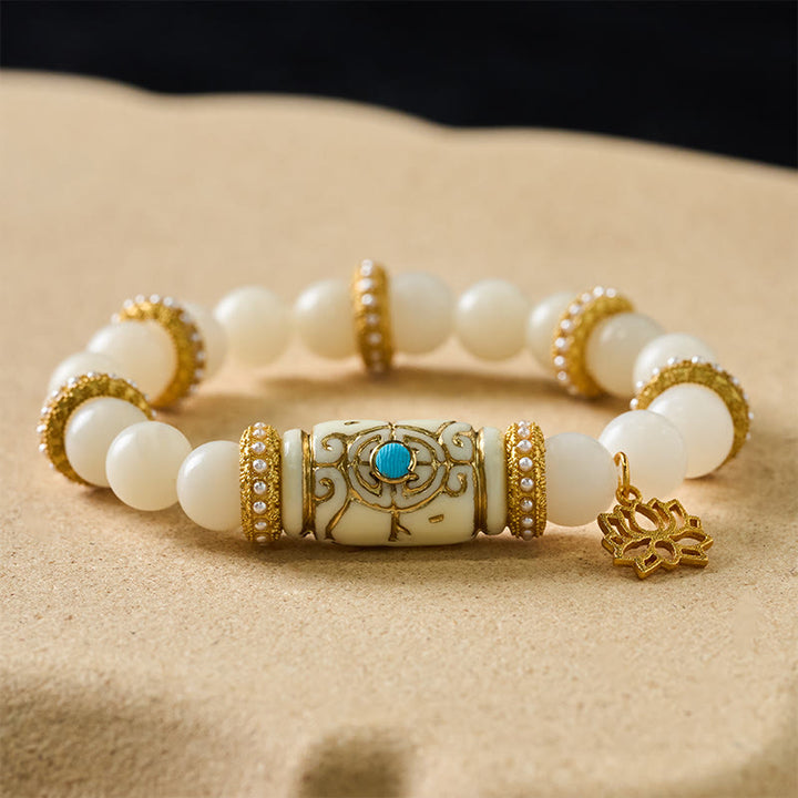 Buddha Stones Bracciale da meditazione rotondo con ciondolo a forma di loto in resina bianca con semi di Bodhi e barilotto, ideale per la meditazione. - image 1