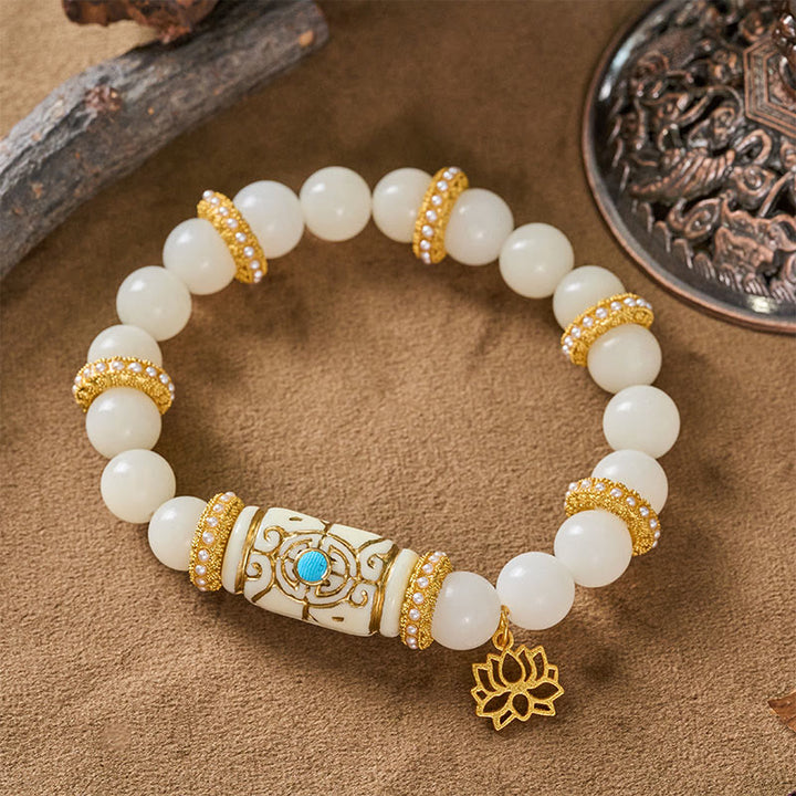 Buddha Stones Bracciale da meditazione rotondo con ciondolo a forma di loto in resina bianca con semi di Bodhi e barilotto, ideale per la meditazione. - image 2
