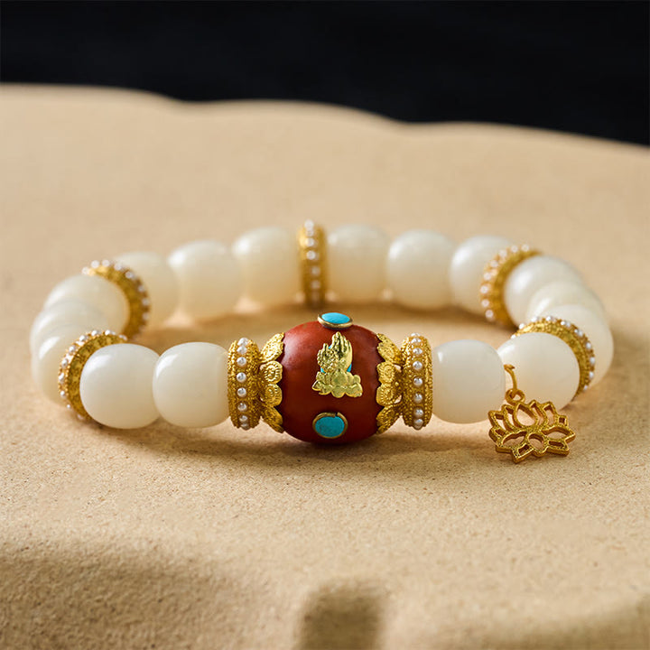 Buddha Stones Braccialetto con ciondolo ovale arancione a forma di loto, inciso tibetano e seme di Bodhi bianco, portafortuna. Braccialetto con perline portafortuna. - image 1