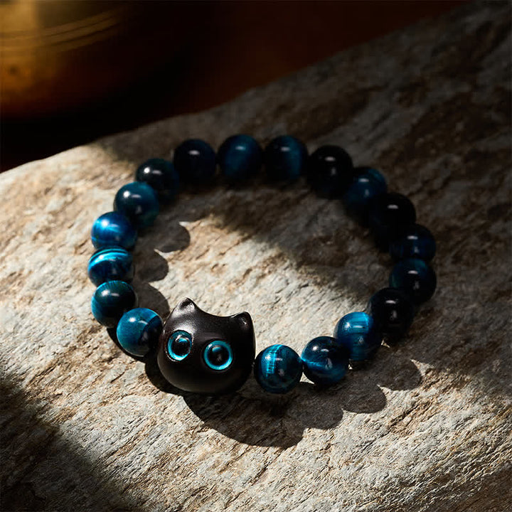 Buddha Stones Braccialetto di forza per gatti in ebano e legno con occhio di tigre blu - image 3