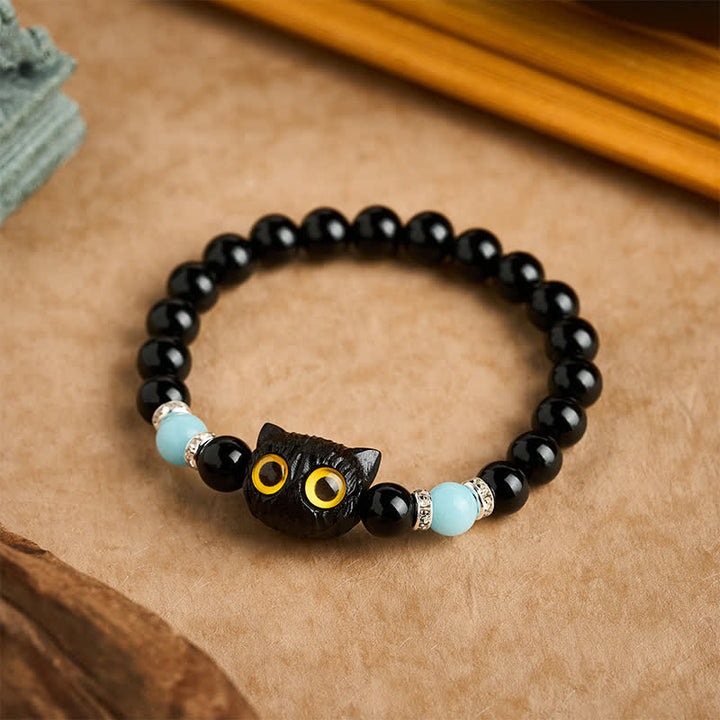 Buddha Stones Bracciale con perline di purezza a forma di testa di gatto con occhi grandi, in ossidiana nera e calcedonio bianco - image 16