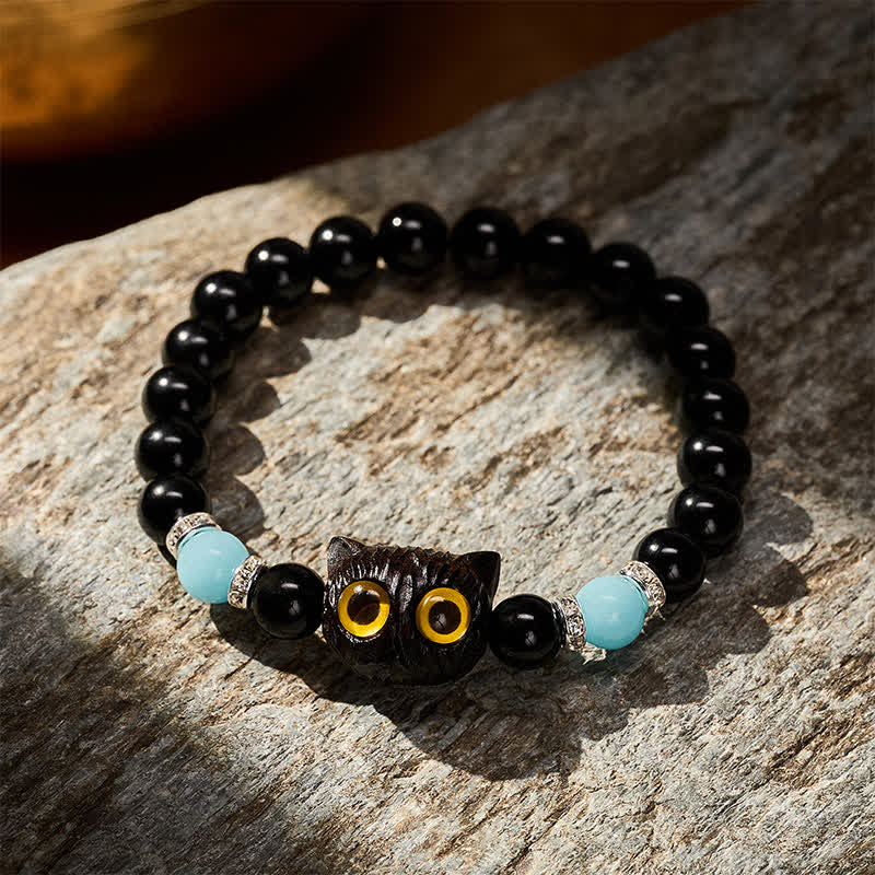 Buddha Stones Bracciale con perline di purezza a forma di testa di gatto con occhi grandi, in ossidiana nera e calcedonio bianco - image 21