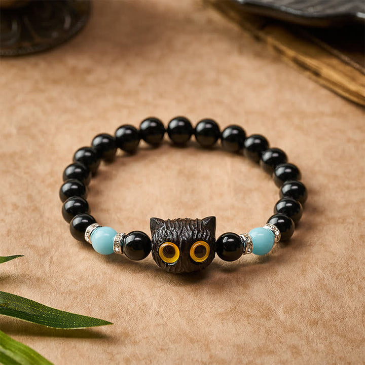Buddha Stones Bracciale con perline di purezza a forma di testa di gatto con occhi grandi, in ossidiana nera e calcedonio bianco - image 22