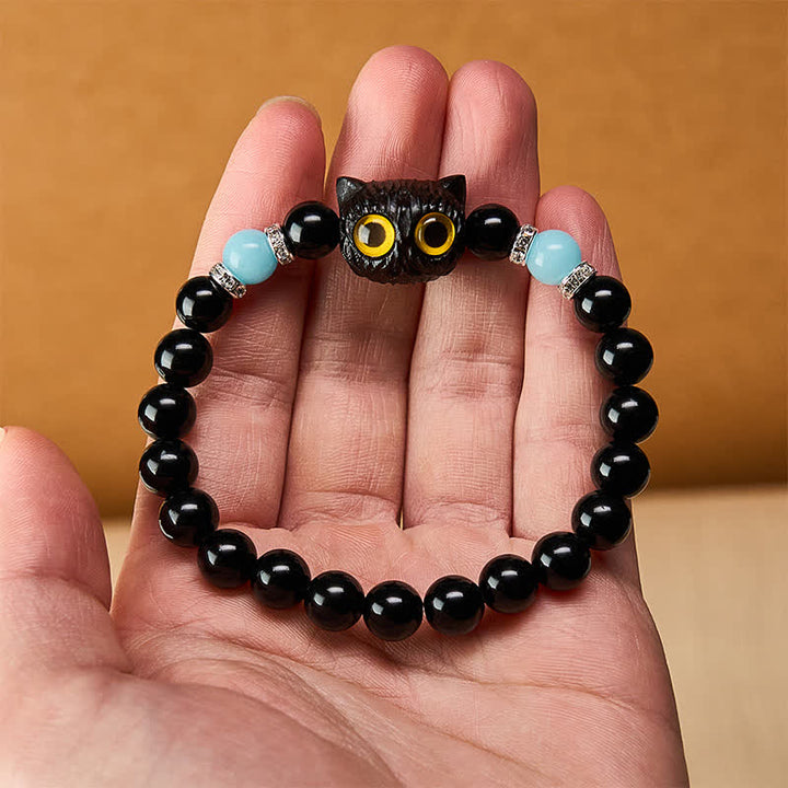 Buddha Stones Bracciale con perline di purezza a forma di testa di gatto con occhi grandi, in ossidiana nera e calcedonio bianco - image 20