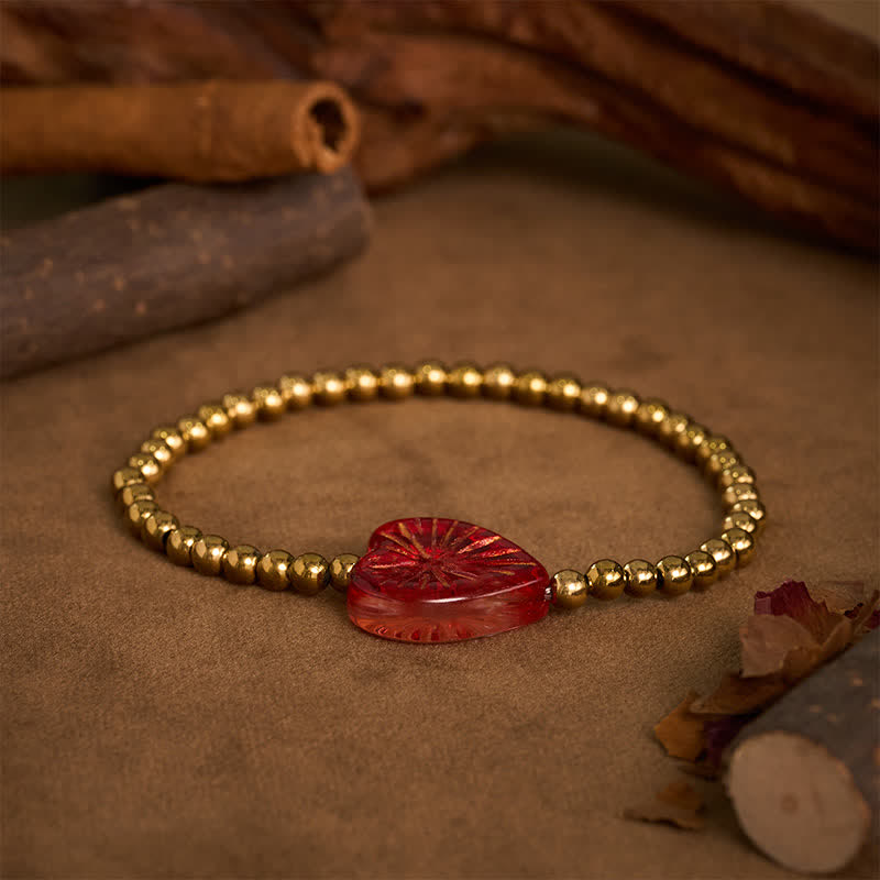 Buddha Stones Bracciale rigido Liuli in acciaio al titanio con perline a forma di cuore e scritta "Strength" - image 1