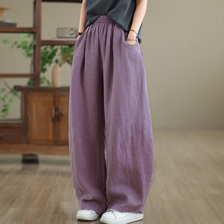 Pantaloni da donna a gamba larga in cotone tinta unita con motivo Buddha Stones e tasche - image 1