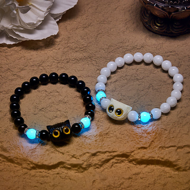 Buddha Stones Bracciale con perline di purezza a forma di testa di gatto con occhi grandi, in ossidiana nera e calcedonio bianco - image 0