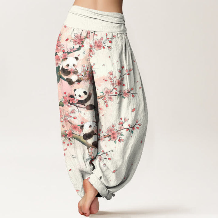 Buddha Stones Pantaloni harem da donna in cotone con motivo a fiori di ciliegio e panda, con elastico in vita. - image 2