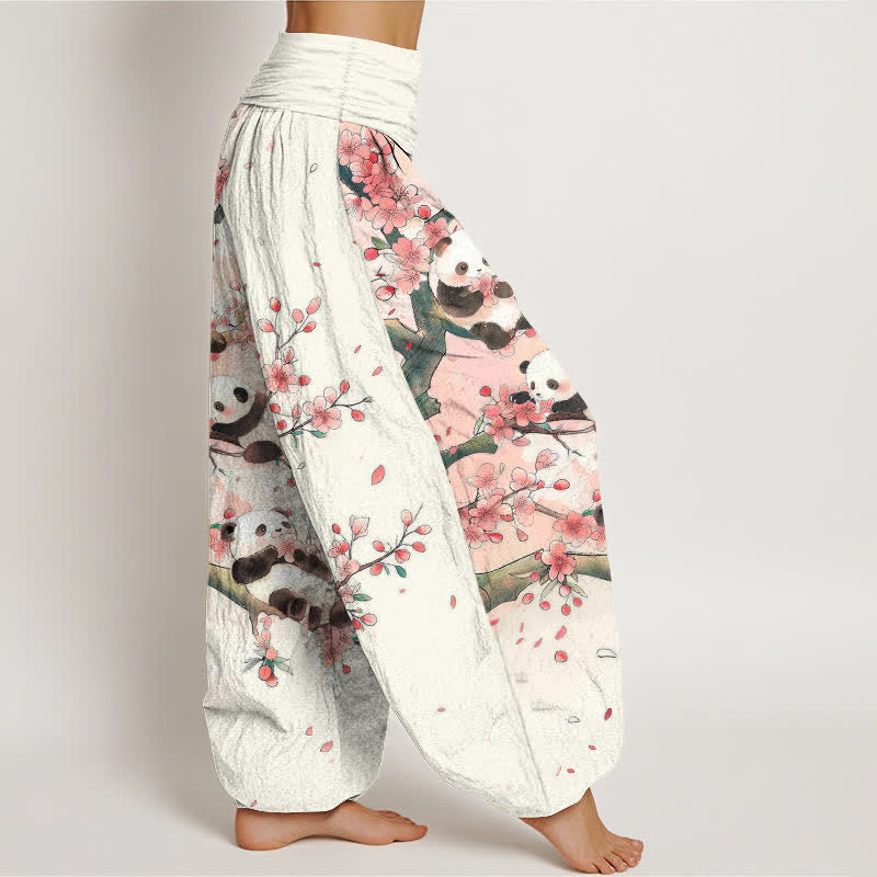 Buddha Stones Pantaloni harem da donna in cotone con motivo a fiori di ciliegio e panda, con elastico in vita. - image 1
