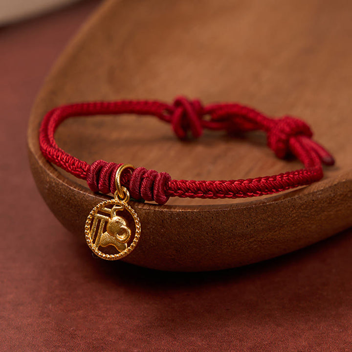 Buddha Stones Braccialetto portafortuna con personaggio Fu, rame placcato oro e cordino rosso, simbolo di ricchezza. - image 13