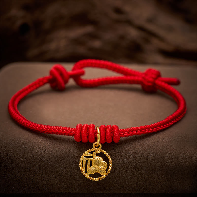 Buddha Stones Braccialetto portafortuna con personaggio Fu, rame placcato oro e cordino rosso, simbolo di ricchezza. - Rosso (circonferenza del polso 15-18 cm) - image 0