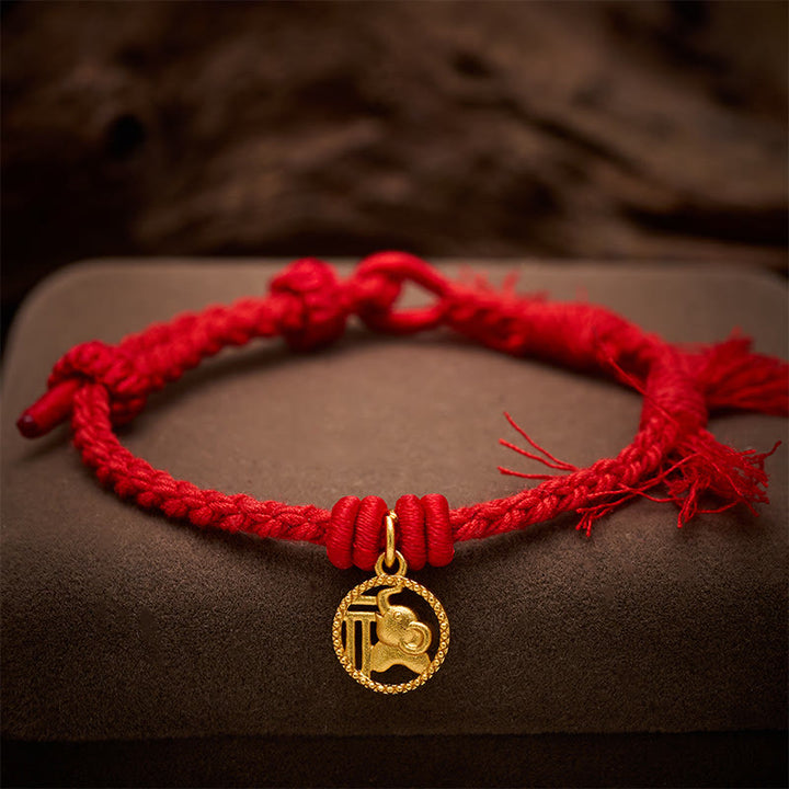 Buddha Stones Bracciale tibetano con bilancia in rame placcato oro con carattere Fu dell'elefante e cordino rosso. - image 3