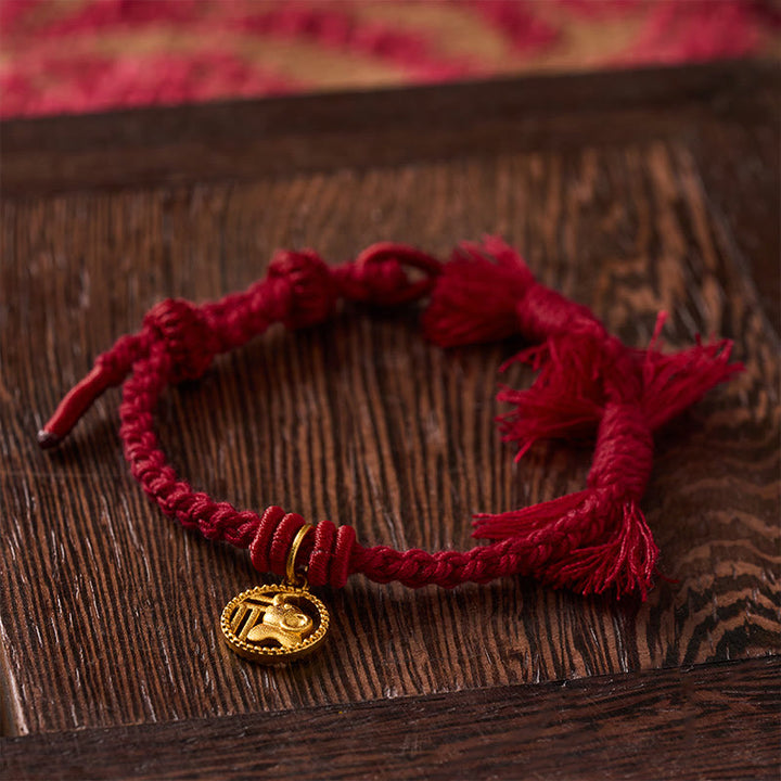 Buddha Stones Bracciale tibetano con bilancia in rame placcato oro con carattere Fu dell'elefante e cordino rosso. - image 13