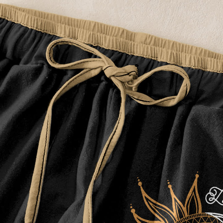 Buddha Stones Pantaloni da donna in puro cotone con elastico in vita e tasche, fantasia mandala sole e luna. - image 1
