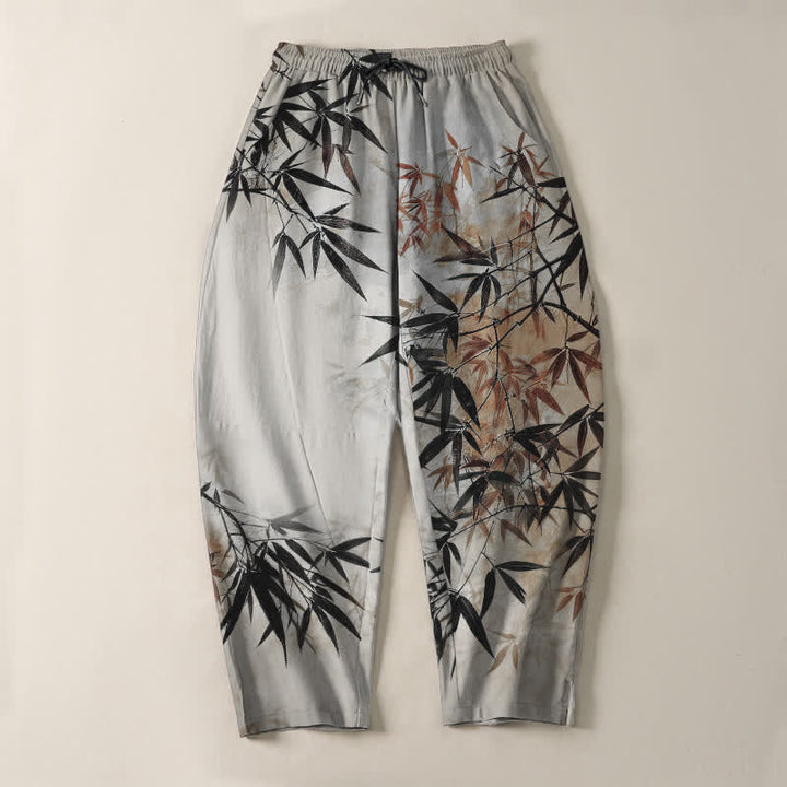Buddha Stones Pantaloni da uomo affusolati con coulisse e tasche, in puro cotone, con stampa a foglie di bambù e motivo a inchiostro. - image 2