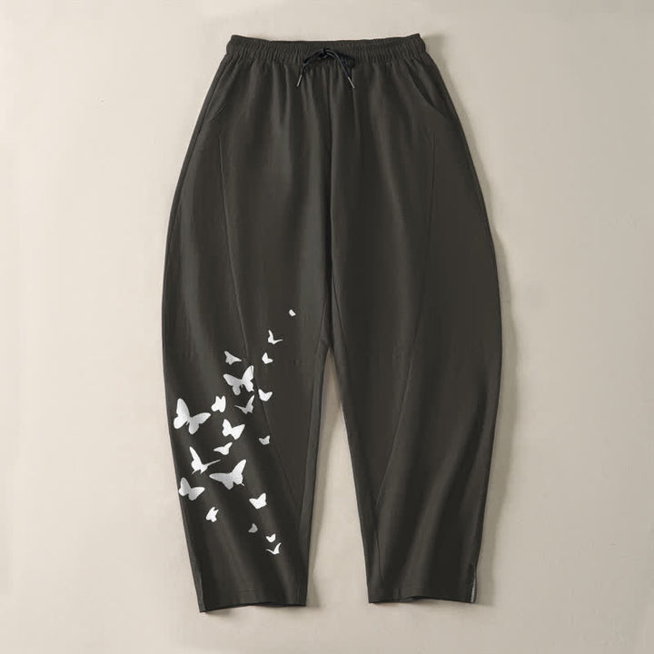 Buddha Stones Pantaloni da uomo affusolati in puro cotone bianco con motivo a farfalle e coulisse, con tasche. - image 2