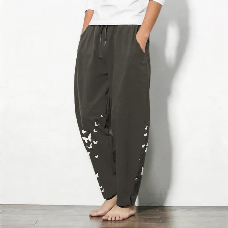 Buddha Stones Pantaloni da uomo affusolati in puro cotone bianco con motivo a farfalle e coulisse, con tasche. - image 1