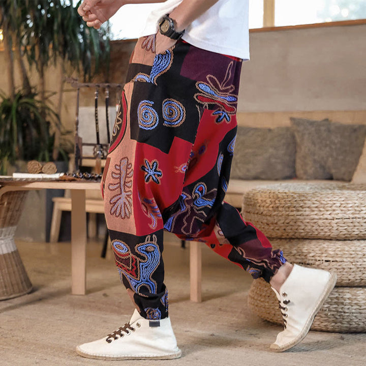 Pantaloni harem da uomo corti con tasche e stampa floreale a griglia con motivo Buddha Stones Grid. - Rosso - US/UK/AU42, EU52 (3XL) - image 0