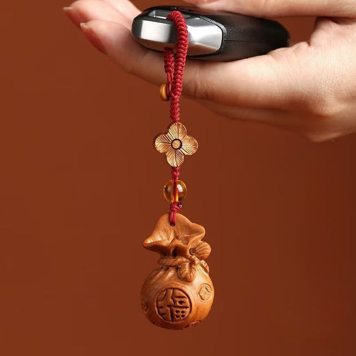 Buddha Stones Portachiavi portafortuna con personaggio Fu in legno di pesca e loto - image 4